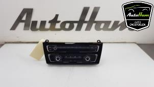 Usados Panel de control de calefacción BMW 1 serie (F20) 116d 1.5 12V TwinPower Precio € 100,00 Norma de margen ofrecido por AutoHam