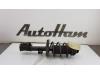 Fronts shock absorber, left from a Opel Adam, 2012 / 2019 1.2 16V, Hatchback, 2-dr, Petrol, 1.229cc, 51kW (69pk), FWD, A12XEL, 2012-10 / 2014-11 2014