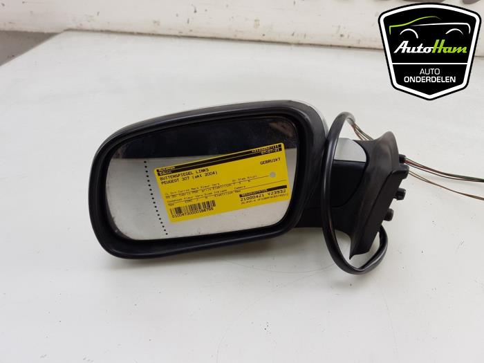 Wing mirror, left from a Peugeot 307 CC (3B) 2.0 16V 2004