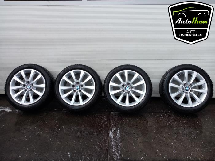 Set of sports wheels + winter tyres from a BMW 5 serie Gran Turismo (F07) 535d 24V 2010