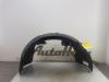 Wheel arch liner from a Ford Transit Courier, 2014 1.6 TDCi, Delivery, Diesel, 1.560cc, 70kW (95pk), FWD, T3CA; T3CB; T3CC, 2014-02 2016
