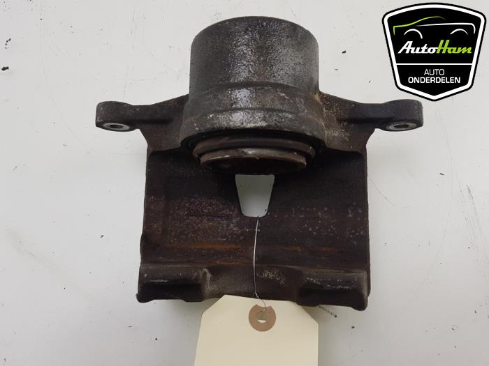 Front brake calliper, left from a Kia Sportage (QL) 1.6 GDI 16V 4x2 2018