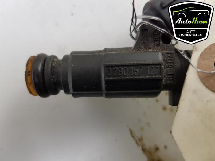 Injector (petrol injection) from a Peugeot 208 I (CA/CC/CK/CL) 1.2 Vti 12V PureTech 82 2018