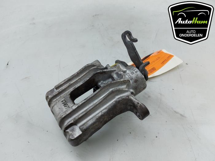 Rear brake calliper, left from a Seat Arona (KJX) 1.0 TSI 12V 2020