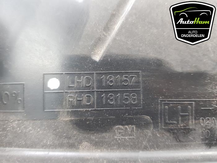 Phare gauche d'un Daewoo Aveo 1.3 D 16V 2012