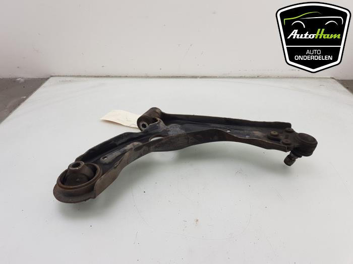 Front wishbone, left from a Daewoo Aveo 1.3 D 16V 2012
