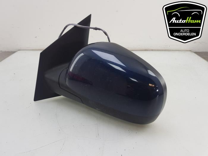 Wing mirror, left from a Nissan Note (E11) 1.4 16V 2008