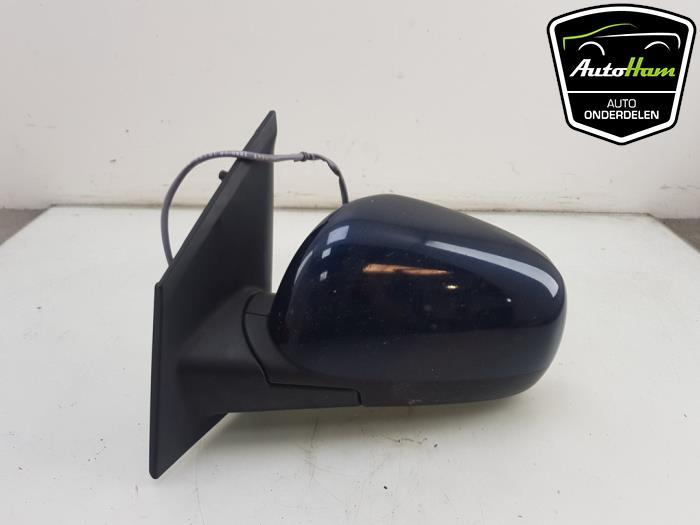 Wing mirror, left from a Nissan Note (E11) 1.4 16V 2008