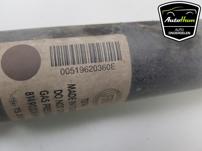 Rear shock absorber, left from a Opel Combo 1.3 CDTI 16V 2018