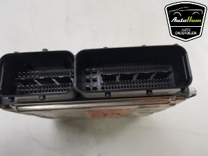 Engine management computer from a Audi A6 Avant (C6) 2.0 T FSI 16V 2008