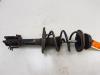 Fronts shock absorber, left from a Dacia Logan MCV II/Sandero Wagon (7S) 0.9 TCE 12V 2014