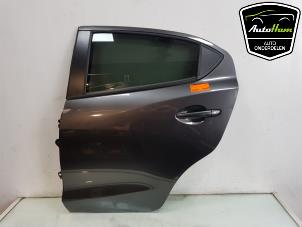 Gebrauchte Tür 4-türig links hinten Mazda 2 (DJ/DL) 1.5 SkyActiv-G 90 Preis auf Anfrage angeboten von AutoHam