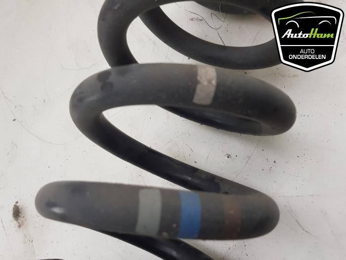 Rear coil spring from a Jaguar F-Pace 3.0 D 24V AWD 2017