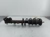 Fronts shock absorber, left from a Nissan Note (E12) 1.2 68 2014