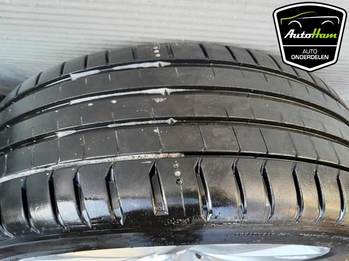 Sport rims set + tires from a Opel Astra J Sports Tourer (PD8/PE8/PF8) 1.4 Turbo 16V 2015