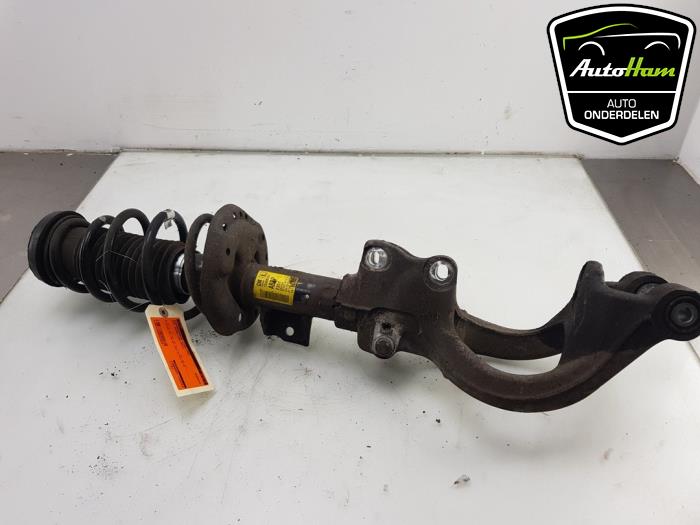 Fronts shock absorber, left from a Opel Astra J GTC (PD2/PF2) 1.4 Turbo 16V ecoFLEX 140 2012