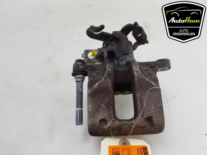 Rear brake calliper, left from a Toyota Auris Touring Sports (E18) 1.8 16V Hybrid 2016