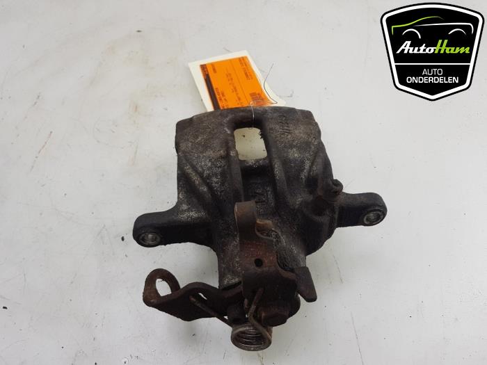 Rear brake calliper, left from a Renault Trafic New (FL) 1.9 dCi 82 16V 2002