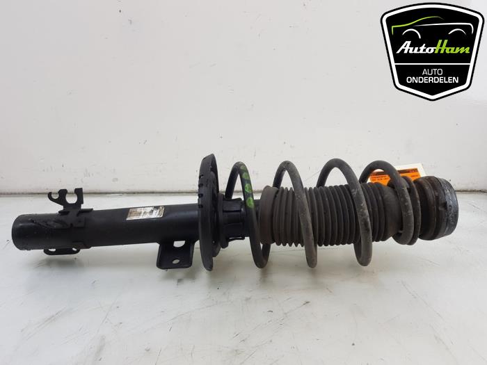 Fronts shock absorber, left from a Seat Ibiza IV (6J5) 1.4 TDI 12V 2017