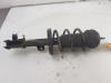 Fronts shock absorber, left from a Opel Adam, 2012 / 2019 1.4 16V, Hatchback, 2-dr, Petrol, 1.398cc, 64kW (87pk), FWD, A14XEL, 2012-10 / 2015-12 2013