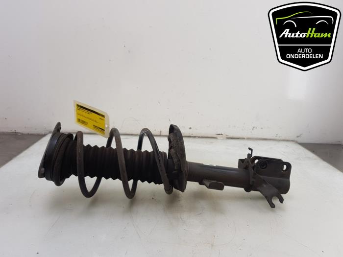 Fronts shock absorber, left from a Renault Clio IV Estate/Grandtour (7R) 0.9 Energy TCE 90 12V 2020
