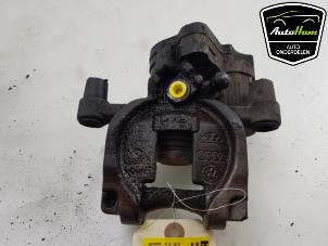 Used Rear brake calliper, left Audi A3 (8V1/8VK) 2.0 TDI 16V Price € 125,00 Margin scheme offered by AutoHam