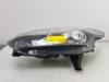 Headlight, left from a Ford Transit Connect (PJ2) 1.6 TDCi 16V 95 2015