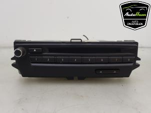 Usados Unidad de control multimedia BMW 3 serie (E90) 318i 16V Precio € 150,00 Norma de margen ofrecido por AutoHam