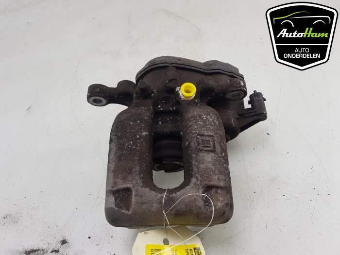 Rear brake calliper, left from a Opel Astra K Sports Tourer 1.6 CDTI 110 16V 2016