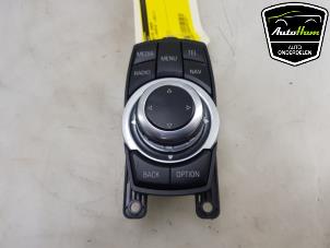 Used I-Drive knob BMW 1 serie (F20) 116i 1.5 12V Price € 50,00 Margin scheme offered by AutoHam