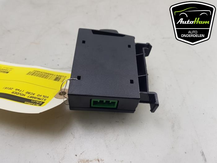 SIM card holder from a Volvo XC90 II 2.0 D5 16V AWD 2016