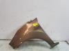 Front wing, left from a Ford Fiesta 6 (JA8) 1.0 SCI 12V 80 2013