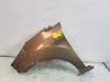 Front wing, left from a Ford Fiesta 6 (JA8) 1.0 SCI 12V 80 2013