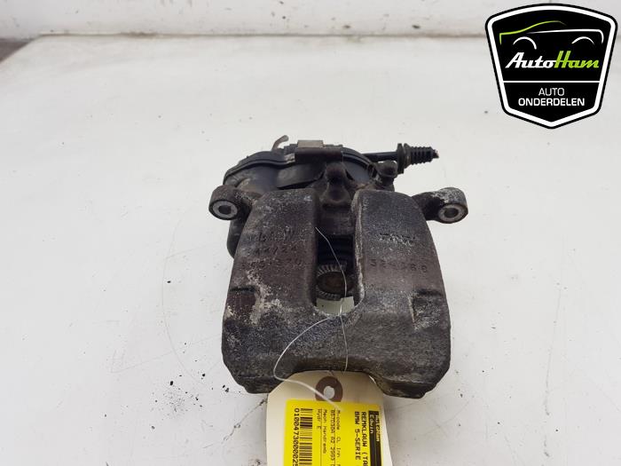 Rear brake calliper, left from a BMW 5 serie Touring (G31) 530d 3.0 TwinPower Turbo 24V 2019