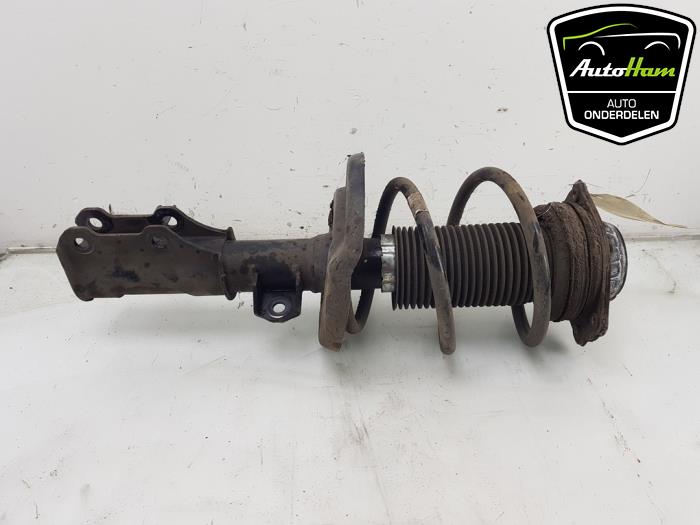 Fronts shock absorber, left from a Opel Insignia Sports Tourer 1.6 Turbo 16V 200 2019