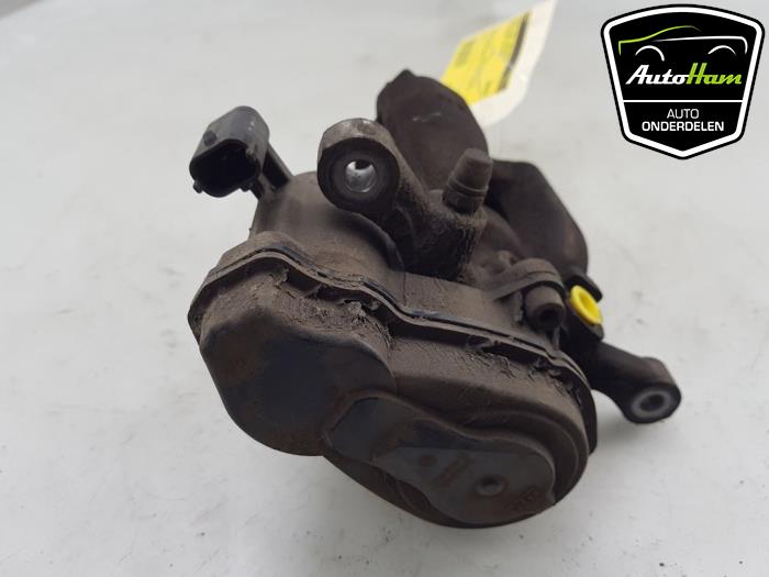Rear brake calliper, left from a Opel Insignia Sports Tourer 1.6 Turbo 16V 200 2019