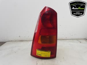 Used Taillight, left Ford Focus 1 Wagon 1.8 16V Price € 30,25 Inclusive VAT offered by AutoHam