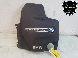 Usados Chapa protectora motor BMW 5 serie (F10) 520i 16V Precio € 50,00 Norma de margen ofrecido por AutoHam