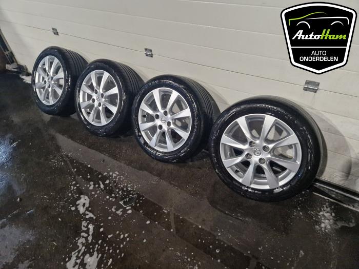 Sport rims set + tires Opel Corsa F 1.2 12V 75 - 39182179 Alloy GM