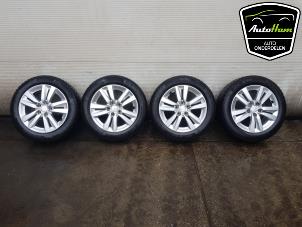 Used Set of sports wheels + winter tyres Peugeot 308 SW (L4/L9/LC/LJ/LR) 1.2 12V e-THP PureTech 130 Price on request offered by AutoHam