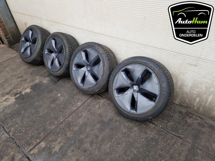 Set of sports wheels + winter tyres from a Tesla Model 3 EV AWD 2019