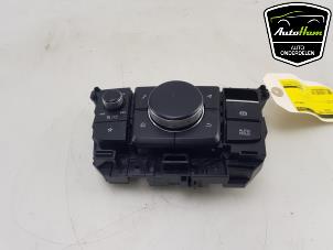 Used Radio control panel Mazda 3 Sport (BP) 2.0 SkyActiv-G 122 Mild Hybrid 16V Price € 95,00 Margin scheme offered by AutoHam