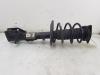 Fronts shock absorber, left from a Peugeot 2008 (UD/UK/UR/US/UX), 2019 1.2 VTi 12V PureTech 100, MPV, Petrol, 1.199cc, 74kW (101pk), FWD, EB2ADT; HNK, 2020-01, USHNK 2020