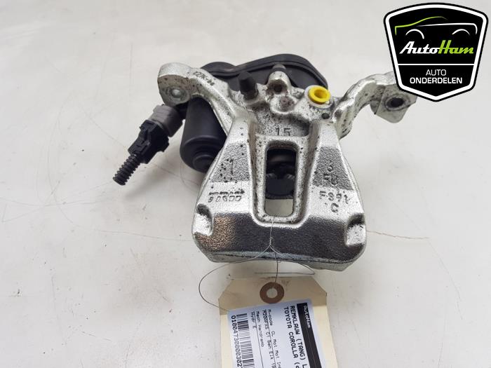 Gebrauchte Bremszange links hinten Toyota Corolla Touring Sport (E21/EH1) 2.0 16V Hybrid 200 Preis € 75,00 Margenregelung angeboten von AutoHam