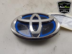 Gebrauchte Emblem Toyota Yaris Cross (PB1/PJ1) 1.5 12V Hybrid 115 Preis € 40,00 Margenregelung angeboten von AutoHam