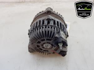 Dynamo från en Renault Megane III Grandtour (KZ) 1.4 16V TCe 130 2011