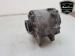 Dynamo van een Audi RS 6 Avant (C7) 4.0 V8 TFSI 32V 2015