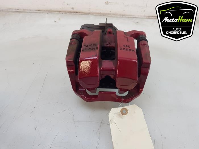 Gebrauchte Bremszange links hinten BMW i4 (G26) eDrive40 84 kWh Preis € 125,00 Margenregelung angeboten von AutoHam