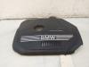 BMW 1 serie (F40) 118i 1.5 TwinPower 12V Cache sous moteur