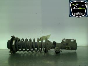 Used Fronts shock absorber, left Kia Rio (DC12) 1.3 Price € 25,00 Margin scheme offered by AutoHam